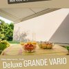 Deluxe GRANDE VARIO  Die Markise mit Vario-Volant ist besonders für Terrassen mit tiefstehender Sonne geeignet.