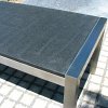 Gartentisch/ Esstisch in Edelstahl gebürstet mit Tischplatte in Naturstein Granit Nero Impala patini